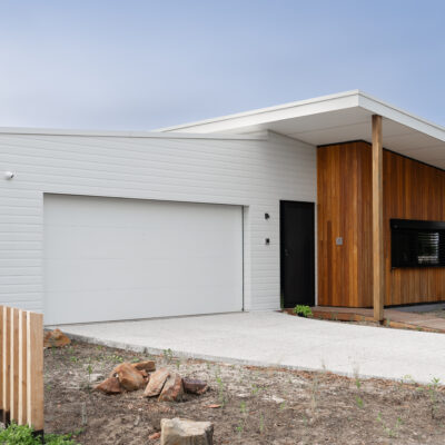 Contemporary house with white and wooden exterior at West Beach.