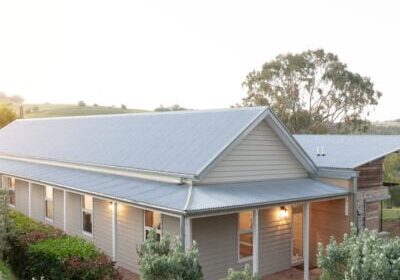 Steel roofing, rural home, landscape, Enduro Builders, quality construction.