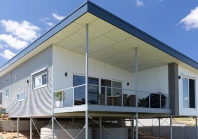 Stylish elevated home with balcony, built by Enduro Builders in Australia.